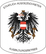 Wappen der Steiermark: Adler mit rot-weißem Schild, umgeben von Schriftzügen für staatliche Auszeichnung und Ausbildungsbetrieb.
